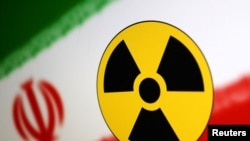  جوہری علامت اور ایرانی پرچم پر مبنی ایک تصویر: رائٹرز 