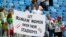 People supporting Iranian women are hold a banner at the stands during the group B match between Morocco and Iran at the 2018 soccer World Cup in the St. Petersburg Stadium in St. Petersburg, Russia, June 15, 2018. 