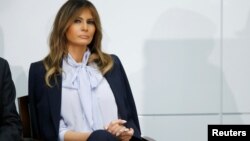 FILE - U.S. first lady Melania Trump waits to speak at the Federal Partners in Bullying Prevention (FPBP) Cyberbullying Prevention Summit on “the positive and negative effects of social media on youth” in Rockville, Maryland, Aug. 20, 2018. 