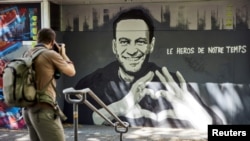 Graffiti of Alexey Navalny by Swiss artists Julien Baro & Lud is pictured ahead of the June 16 summit between U.S. President Joe Biden and Russian President Vladimir Putin in Geneva, Switzerland, June 14, 2021. The text reads: Hero of Our Time.
