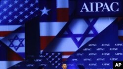 President Barack Obama receives applause as he speaks at the American Israel Public Affairs Committee (AIPAC) convention in Washington Sunday, May 22, 2011