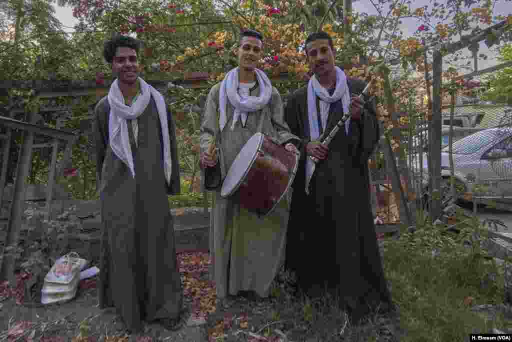 Muslim weddings aren&rsquo;t encouraged during Ramadan. This group of traditional musicians came from Al-Sharqya province to Cairo to play their music in the street for some food or tips.