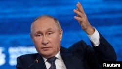 Russian President Vladimir Putin attends a plenary session of the Eastern Economic Forum in Vladivostok