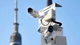FILE - Surveillance cameras sit on a utility pole in Moscow, Russia on February 22, 2020. (AP Photo, File)