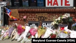 The front of the Stonewall Inn have been covered with flowers, candles and messages in memory of those who were lost in the tragedy. 