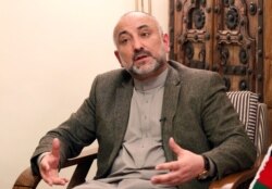FILE - Mohammad Haneef Atmar, former national security adviser and candidate in the upcoming presidential election, speaks during an interview in Kabul, Afghanistan Feb. 23, 2019.