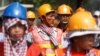 Workers gather as they rally to mark May Day in Phnom Penh, Cambodia, May 1, 2018. 