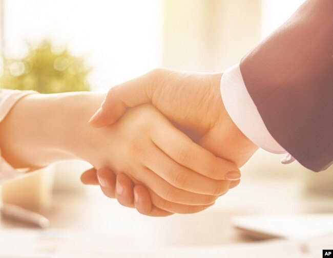 A handshake is something many members of Gen Z have not practiced. (AP Photo)