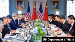 U.S. Secretary of State John Kerry, U.S. Treasury Secretary Jacob Lew, and U.S. Special Envoy for Climate Change Todd Stern participate in a climate meeting with Chinese State Councilor Yang Jiechi and Chinese Vice Premier Wang Yang during the U.S.-China Strategic and Economic Dialogue at the U.S. Department of State in Washington, D.C., on June 23, 2015. (State Department photo)