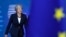 FILE - British Prime Minister Theresa May arrives for an EU summit in Brussels, Oct. 17, 2018. 