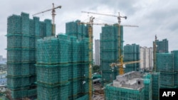 The aerial photo shows a general view of a residential housing complex under construction in Huaian, in eastern China's Jiangsu province on October 17, 2024. 