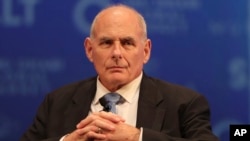 John Kelly, President Donald Trump's former chief of staff, talks during the SALT finance conference in Abu Dhabi, United Arab Emirates, Dec. 10, 2019. 