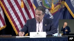 The news of New York Gov. Andrew Cuomo’s forthcoming book comes the day after Cuomo addressed the Democratic National Convention and called the virus' spread a metaphor for a country weakened by division.