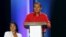 FILE - Peru's presidential candidate Gregorio Santos speaks next to candidate Keiko Fujimori (L) at a presidential debate in Lima, April 3, 2016.   Santos accuses the government of locking him up for two years in order to keep him from power.