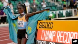 FILE - Norah Jeruto, of Kazakhstan, celebrates after winning the women's 3000-meter steeplechase final at the World Athletics Championships on July 20, 2022, in Eugene, Oregon.