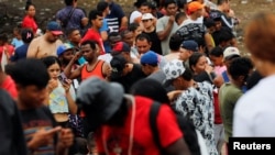 Migrants heading to the U.S. wait at the Migrants Reception Station in Lajas Blancas, Darien province, Panama, September 23, 2023.