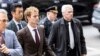 Daniel Penny, center, arrives at criminal court, Dec. 9, 2024, in New York. A Manhattan jury cleared Penny of criminally negligent homicide in Jordan Neely's 2023 death. 