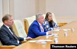 Special Envoy of the Swedish government Kent Harstedt and his party meet with North Korea's Foreign Minister Ri Yong Ho during a courtesy call, in this undated photo released July 4, 2019.