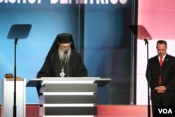Archbishop Demetrios, of the Greed Orthodox Archdiocese of America, gives the benediction at the end of Wednesday's program of the Republican National Convention, July 20, 2016. Republican National Committee chairman Reince Priebus is at right.
