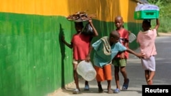 Children playing on a street.