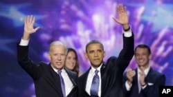 Vice President Joe Biden and President Barack Obama wave to the delegates at the conclusion of Presdident Obama's speech at the Democratic National Convention in Charlotte, N.C., Sept. 6, 2012.