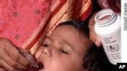 A boy in Bangladesh receives polio immunization.