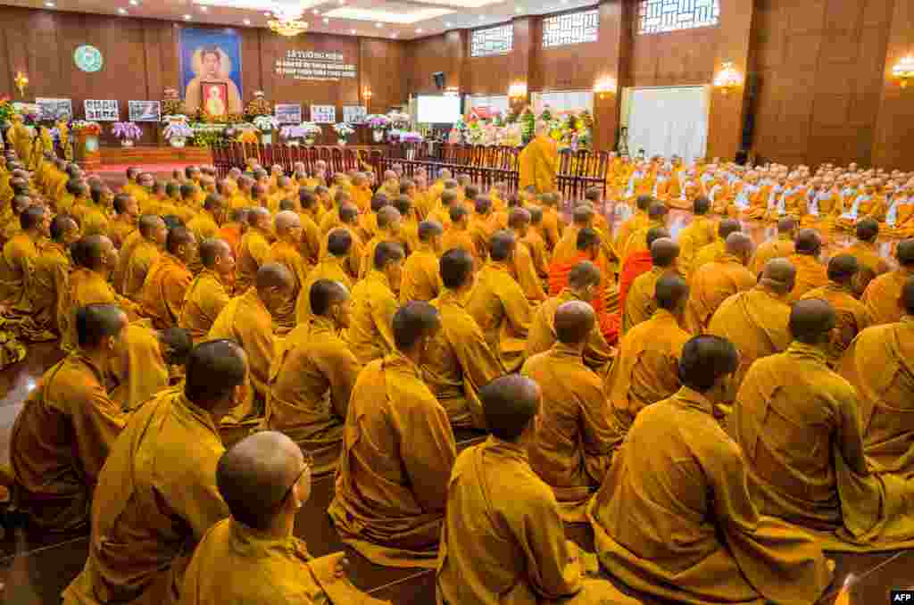Buddhist monks celebrate the anniversary of the self-immolation of monk Thich Quang Duc, who set himself on fire on a busy Saigon street corner in 1963, at the at Vietnam Quoc Tu pagoda in Ho Chi Minh City.