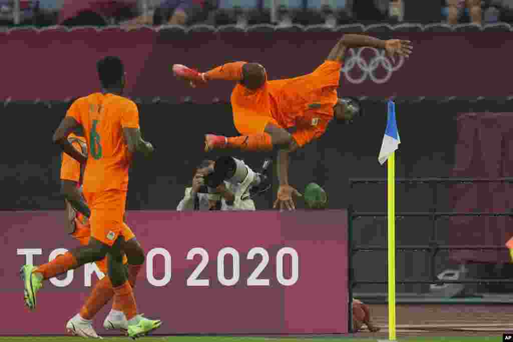 vory Coast's Youssouf Dao celebrates after Germany's Benjamin Henrichs scored an own goal during a men's soccer match at the 2020 Summer Olympics, Wednesday, July 28, 2021, in Rifu, Japan. (AP Photo/Andre Penner)