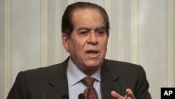 Egypt's prime minister Kamal al-Ganzouri speaks during a news conference at the cabinet headquarters in Cairo, February 8, 2012.