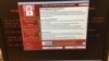 صفحه نمایش یک کامپیوتر مشکوک به حمله سایبری رنسام ور