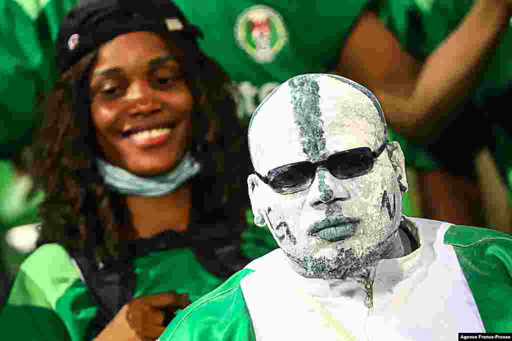 Nigerian fans cheer prior to the football match between Guinea-Bissau and Nigeria in Cameroon on Jan. 19, 2022.
