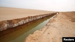 A general view of a trench, that forms part of a barrier along the frontier with Libya, is seen in Sabkeht Alyun, Tunisia February 6, 2016. 