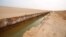 A general view of a trench, that forms part of a barrier along the frontier with Libya, is seen in Sabkeht Alyun, Tunisia February 6, 2016. 