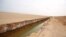 A general view of a trench, that forms part of a barrier along the frontier with Libya, is seen in Sabkeht Alyun, Tunisia February 6, 2016. 