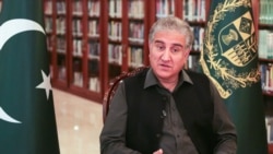 FILE - Pakistan's Foreign Minister Shah Mehmood Qureshi gestures as he speaks during an interview at the Foreign Ministry in Islamabad, Pakistan, March 1, 2020.