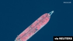 FILE - A handout satellite image released July 15, 2020, shows the FSO Safer oil tanker anchored off the marine terminal of Ras Isa, Yemen, June 17, 2020. 