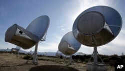 FILE - Radio telescopes of the Allen Telescope Array are seen in Hat Creek, Calif. 