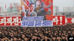 North Koreans gather during a mass rally to vow to carry through the tasks set forth by North Korean leader Kim Jong Un in his New Year's address, at Kim Il Sung Square in Pyongyang, North Korea, Jan. 5, 2017.