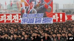 North Koreans gather during a mass rally to vow to carry through the tasks set forth by North Korean leader Kim Jong Un in his New Year's address, at Kim Il Sung Square in Pyongyang, North Korea, Jan. 5, 2017.