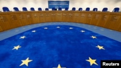 FILE - General view of the plenary room of the European Court of Human Rights in Strasbourg, France, Nov. 27, 2013. 