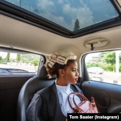 Ginika is on her way to join thousands of Nigerian law graduates called to bar in Abuja, Nigeria. @tomsaater from the book “Everyday Africa: 30 Photographers Re-Picturing a Continent.”