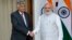 Sri Lankan Prime Minister Ranil Wickremesinghe, left and Indian Prime Minister Narendra Modi pose for the media before their talks in New Delhi, India, Sept. 15, 2015. 