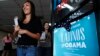 FILE - Two volunteers for President Barack Obama's campaign, Carissa Valdez, right, and Vanessa Trujillo, leave campaign headquarters as they work to register new voters while they canvass a heavily Latino neighborhood shopping plaza in Phoenix, June 29, 2012.