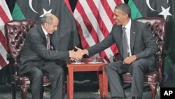 President Barack Obama meets with the National Transitional Council Chairman Mustafa Abdel Jalil at the United Nations Building in New York, September 20, 2011.