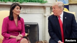 U.S. President Trump meets with U.N. Ambassador Haley in the Oval Office of the White House in Washington.