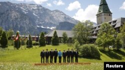 Leaders of the Group of Seven (G7) nations and the EU take part in a family photo at the G7 Summit in Kruen, Germany, June 7, 2015.