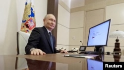 Presidente russo, Vladimir Putin, vota através da internet, 15 março 2024
