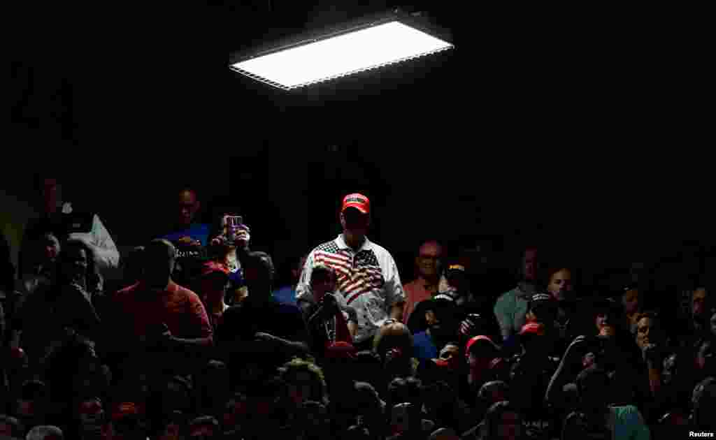 Supporters of U.S. President Donald Trump wait for him to appear for a rally at North Side middle school in Elkhart, Indiana.