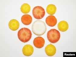 Sliced carrots exhibiting a broad range of naturally occurring carotenoid pigments in this image released May 9, 2016. (Courtesy: Shelby Ellison)