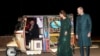 Britain&#39;s Prince William and Catherine, Duchess of Cambridge, arrive by Tuk Tuk to attend a reception hosted by the British High Commissioner to Pakistan, Thomas Drew, at the Pakistan National Monument in Islamabad.